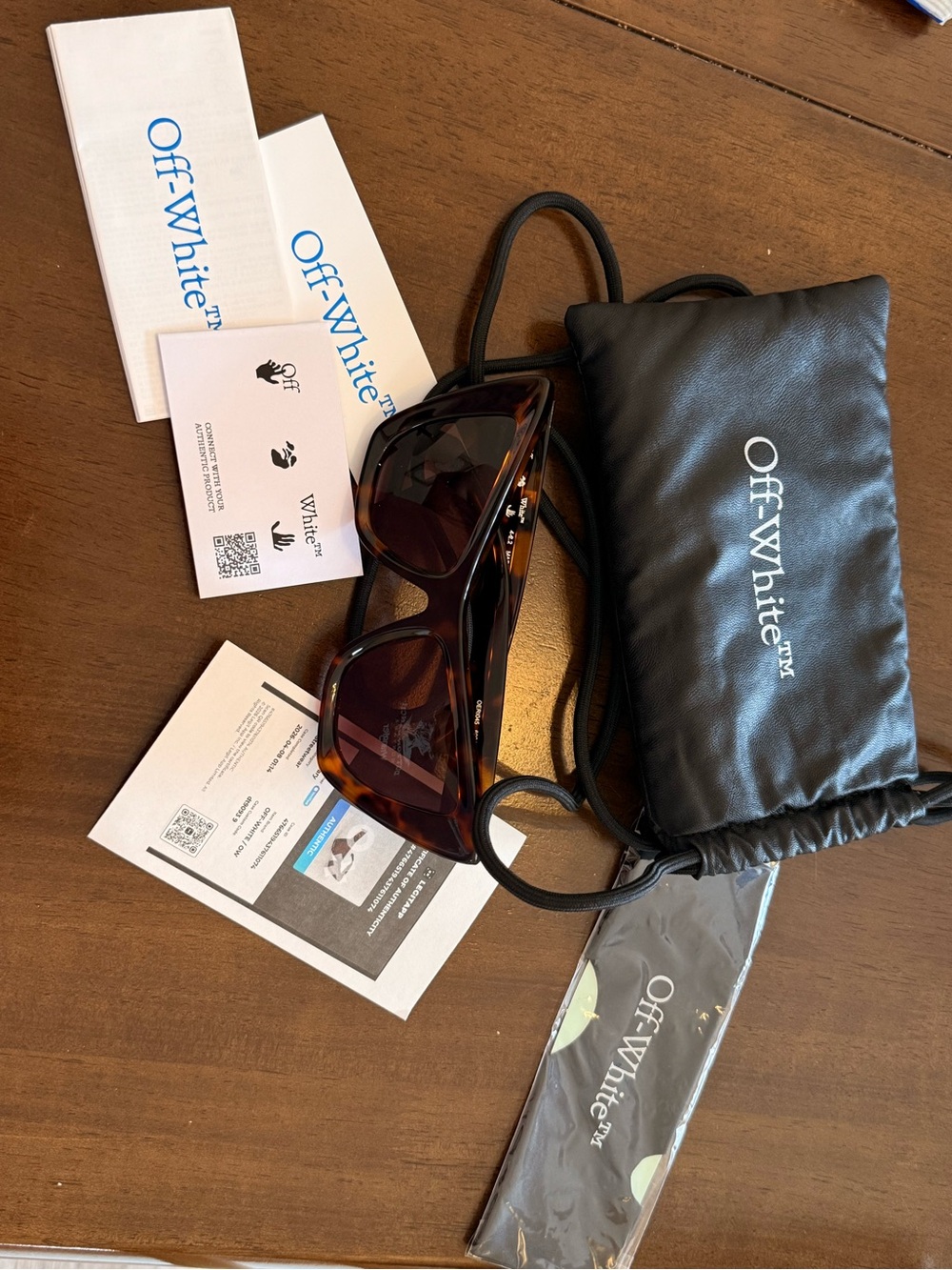Off-White Tortoiseshell Sunglasses with Black Case